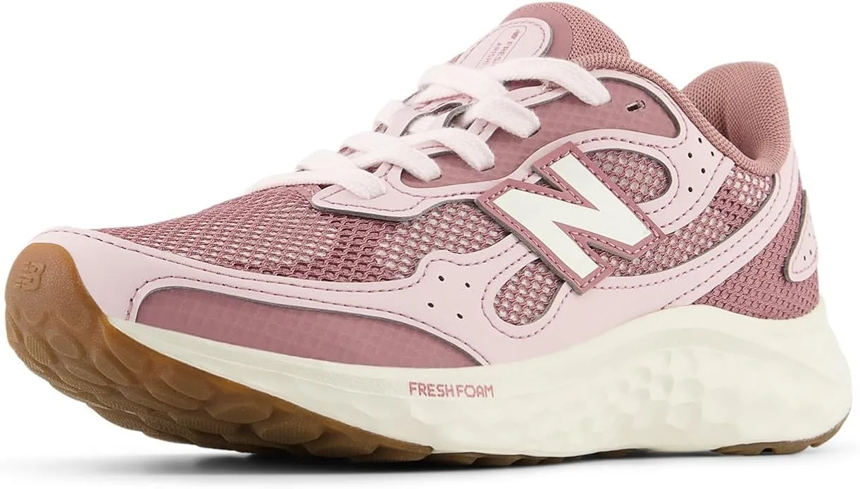 New Balance Fresh Foam Arishi V4 Tiralux pink running sneaker angled studio profile